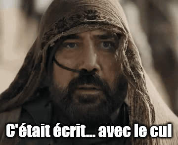 A Man With A Beard Is Wearing A Scarf Around His Head And Says C ' Était Écrit Avec Le Cul GIF