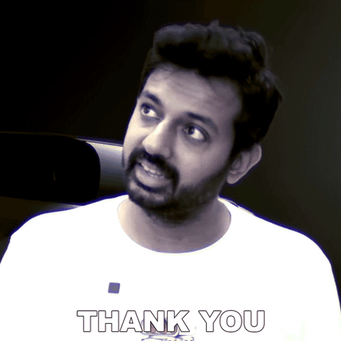 A Man With A Beard Is Wearing A Shirt That Says Thank You GIF