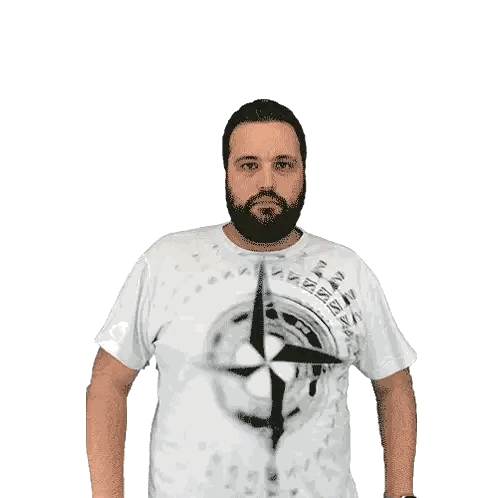 a man with a beard is wearing a t-shirt with a compass on it
