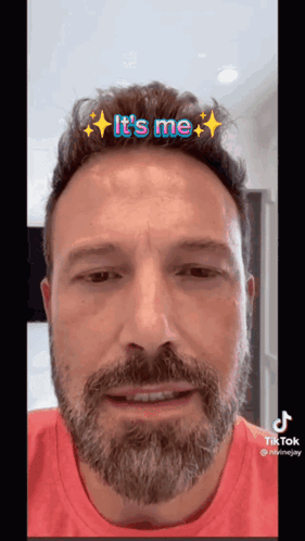 A Man With A Beard Is Wearing A Tiktok Filter That Says It 'S Me . GIF
