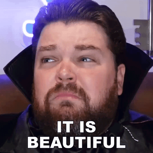 A Man With A Beard Is Wearing A Vampire Costume And Says " It Is Beautiful " GIF