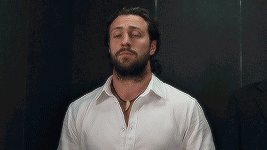 Bearded Man In White Shirt And Necklace GIF