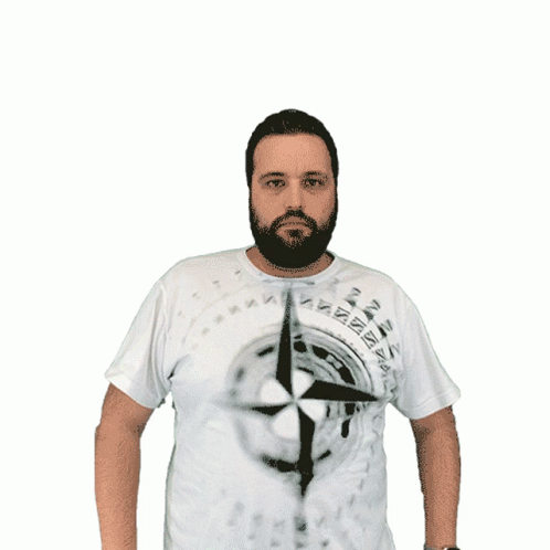 A Man With A Beard Is Wearing A White Shirt With A Picture Of A Compass On It GIF
