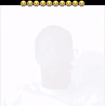 A Man With A Beard Is Wearing A White Shirt With An Apple Logo On The Front GIF