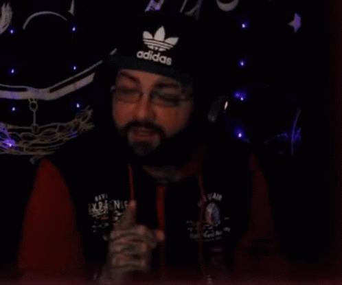 A Man With A Beard Is Wearing An Adidas Hat And Glasses And Says I 'M Glad You Said That . GIF