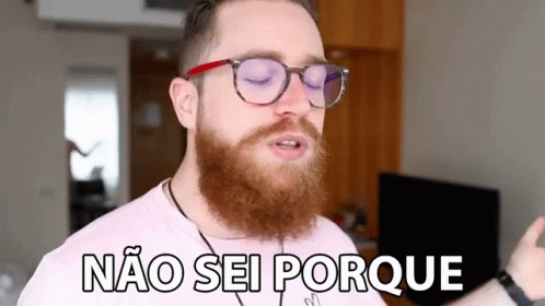 A Man With A Beard Is Wearing Glasses And Says Não Sei Porque GIF