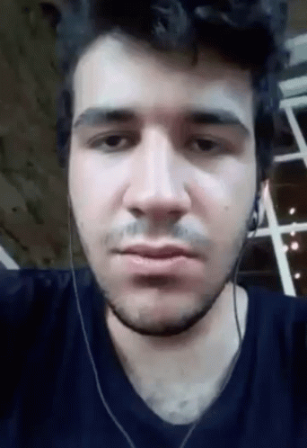 Man With Beard Making Funny Face Wearing Headphones GIF