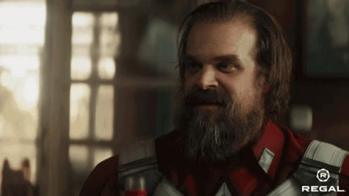 Man With Beard Wearing Overalls And Red Regal Shirt GIF