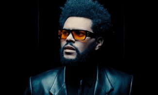 A Man With A Beard Is Wearing Sunglasses And A Black Jacket GIF