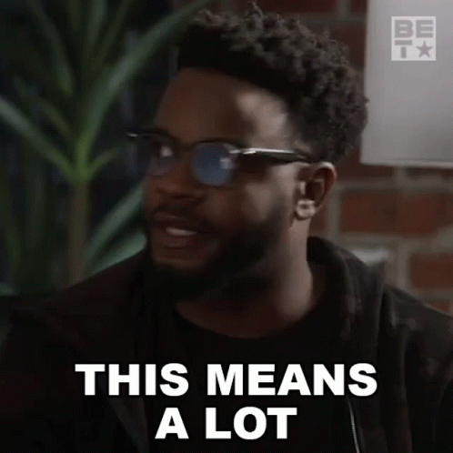 A Man With A Beard Is Wearing Sunglasses And Says This Means A Lot . GIF