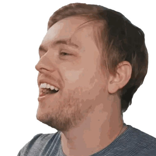 a man with a beard laughs with his mouth open