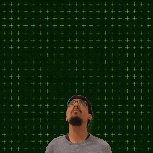 A Man With A Beard Looks Up At The Number 16 GIF