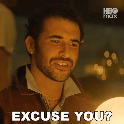 A Man With A Beard Says Excuse You In Front Of A Hbo Max Logo GIF