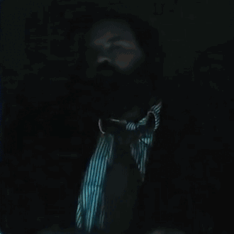 A Man With A Beard Says I 'M A Detective While Pointing At His Head GIF