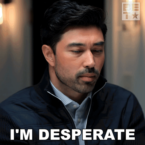 A Man With A Beard Says I 'M Desperate On His Face GIF