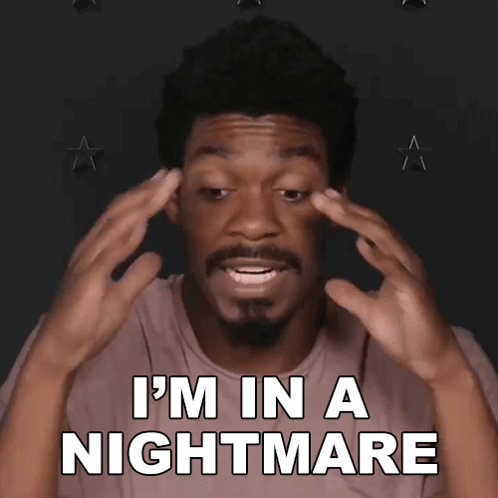 A Man With A Beard Says I 'M In A Nightmare With His Hands On His Head GIF