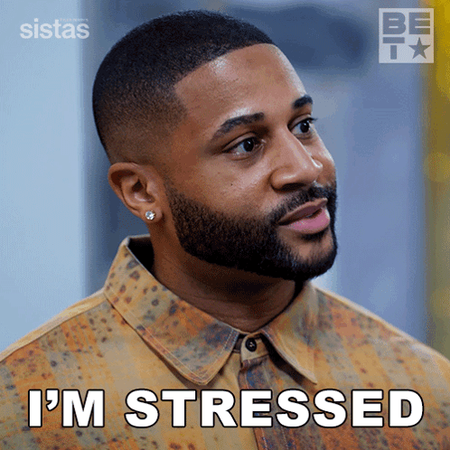 a man with a beard says i 'm stressed on a screen