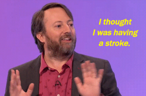 A Man With A Beard Says I Thought I Was Having A Stroke On A Purple Background GIF
