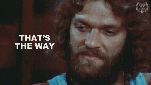 A Man With A Beard Says " I Was Taught To Behave " In Front Of Him GIF