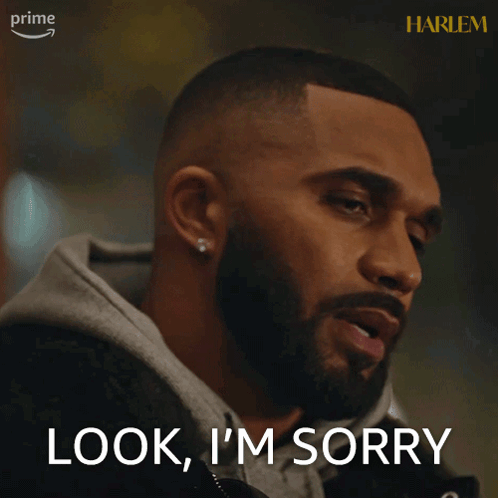 A Man With A Beard Says " Look I 'M Sorry " On A Screen GIF