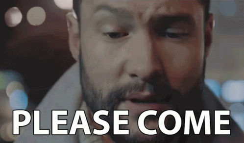 A Man With A Beard Says Please Come In A Close Up GIF