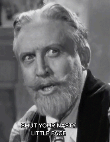A Man With A Beard Says Shut Your Nasty Little Face In A Black And White Photo GIF