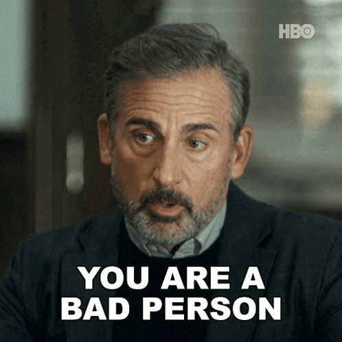 A Man With A Beard Says " You Are A Bad Person " While Wearing A Suit GIF