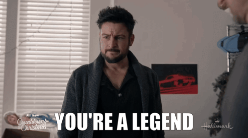 A Man With A Beard Says " You 'Re A Legend " In A Hallmark Ad GIF
