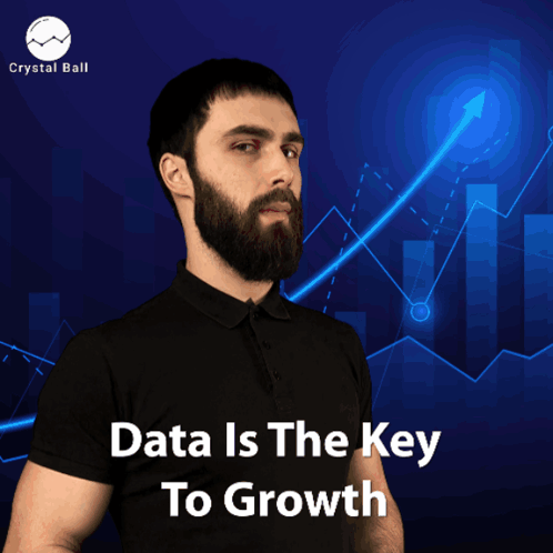 A Man With A Beard Stands In Front Of A Graph With The Words Data Is The Key To Growth GIF