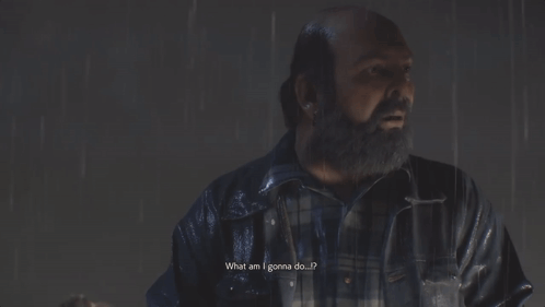 A Man With A Beard Stands In The Rain Next To A Woman GIF