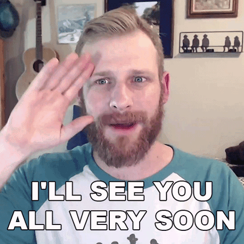 A Man With A Beard Waving His Hand With The Words I 'Ll See You All Very Soon Below Him GIF