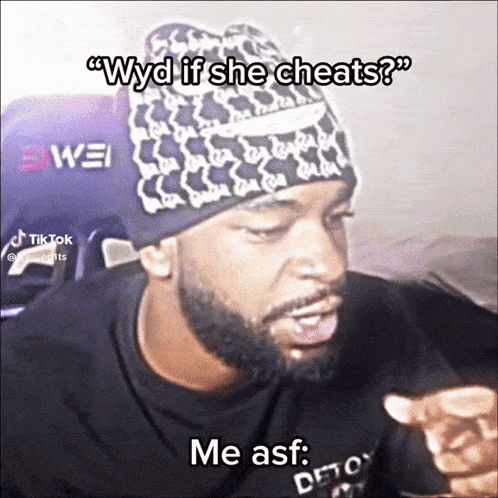 A Man With A Beard Wearing A Beanie Says " Wyd If She Cheats " Me Asf GIF