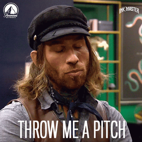 A Man With A Beard Wearing A Black Hat And A Bandana Says Throw Me A Pitch GIF