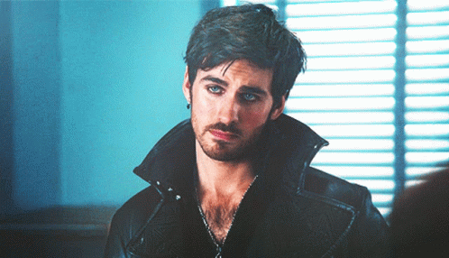 A Man With A Beard Wearing A Black Leather Jacket GIF