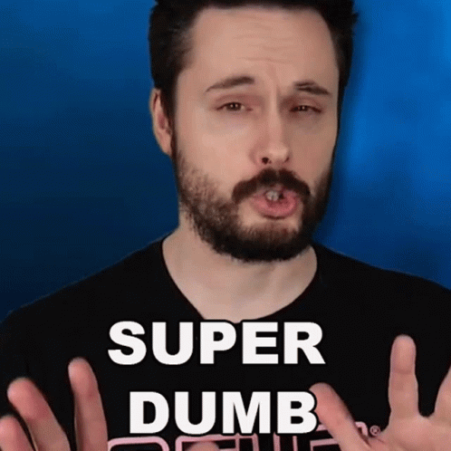 A Man With A Beard Wearing A Black Shirt That Says Super Dumb GIF