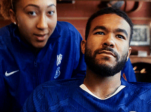 A Man With A Beard Wearing A Blue Nike Shirt GIF