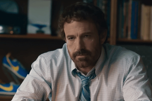 A Man With A Beard Wearing A Blue Tie GIF