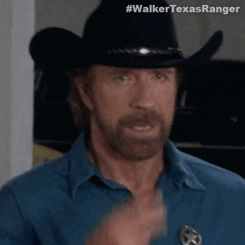 A Man With A Beard Wearing A Cowboy Hat And A Badge That Says Walker Texasranger GIF