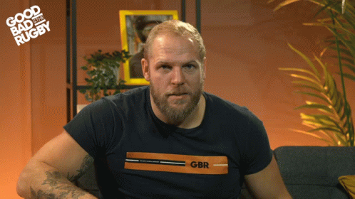 A Man With A Beard Wearing A Gbr Shirt GIF
