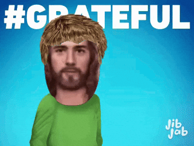 A Man With A Beard Wearing A Green Shirt With The Words #Grateful Above Him GIF
