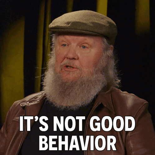 A Man With A Beard Wearing A Hat And A Brown Jacket Says It 'S Not Good Behavior GIF