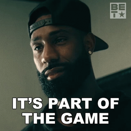 A Man With A Beard Wearing A Hat And Earrings Says It 'S Part Of The Game GIF