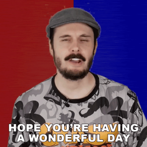 A Man With A Beard Wearing A Hat Says Hope You 'Re Having A Wonderful Day GIF