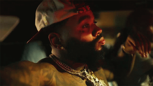 A Man With A Beard Wearing A Hat That Says Ny GIF