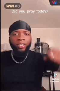 A Man With A Beard Wearing A Headband And A Chain Is Asking If He Prayed Today . GIF
