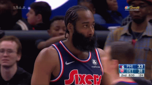 A Man With A Beard Wearing A Jersey That Says Sixers GIF