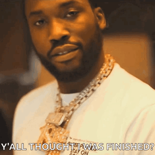 A Man With A Beard Wearing A Necklace And A White Shirt Says Y All Thought I Was Finished ? GIF
