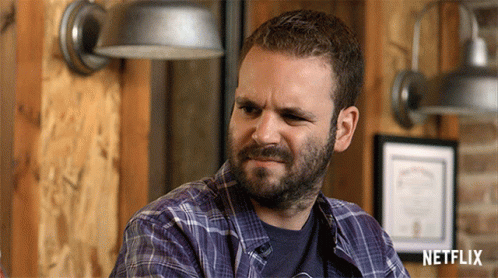 Bearded Man In Plaid Shirt With Netflix Logo GIF