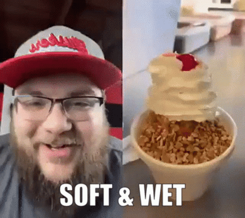 A Man With A Beard Wearing A Red Hat And Glasses Next To A Cup Of Ice Cream That Says Soft & Wet GIF