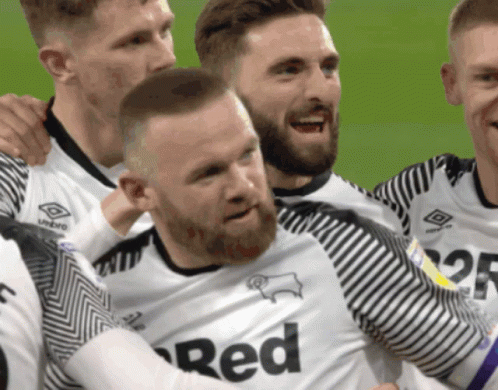 A Man With A Beard Wearing A Red Jersey GIF